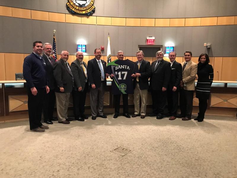 Recognizing DE Turf Wall of Fame honoree Brooks Banta are (l-r) Chris Giacomucci; Michael Petitdemange; Kent County Commissioners Glen M. Howell; George "Jody" Sweeney; Jeffrey W. Hall; P. Brooks Banta; Terry L. Pepper; Allan F. Angel; Eric L. Buckson; William Strickland; and Shelly Cecchett. SUBMITTED PHOTO